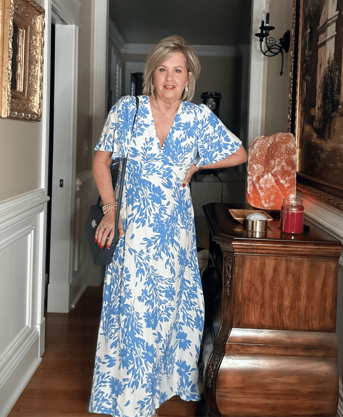 Tania Stephens wearing affordable and budget friendly clothing - a blue and white floral dress from Target